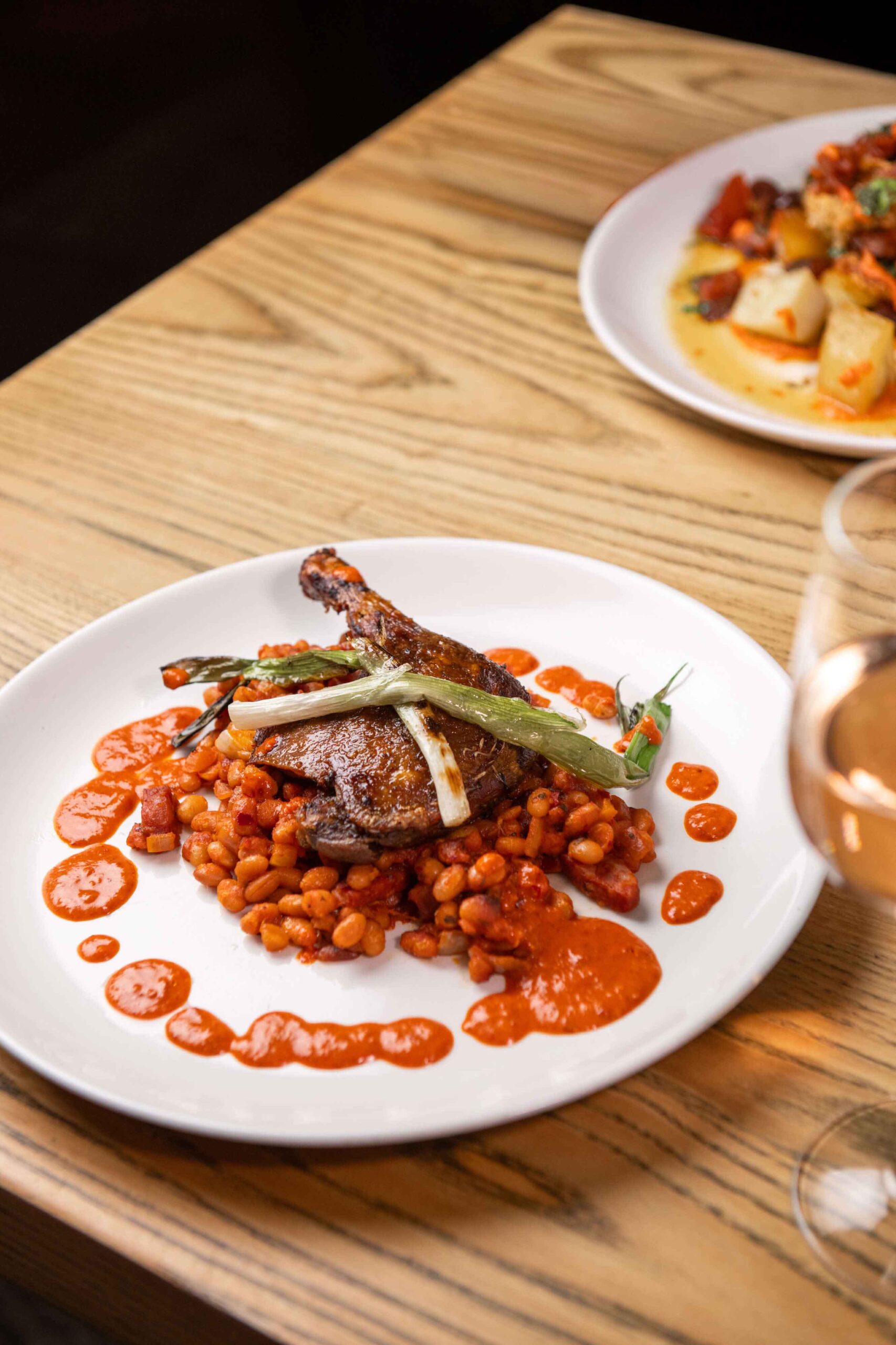 Crispy duck leg, chorizo & haricot beans